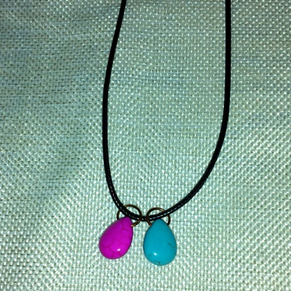 Pretty pink and blue 2 moon necklace.